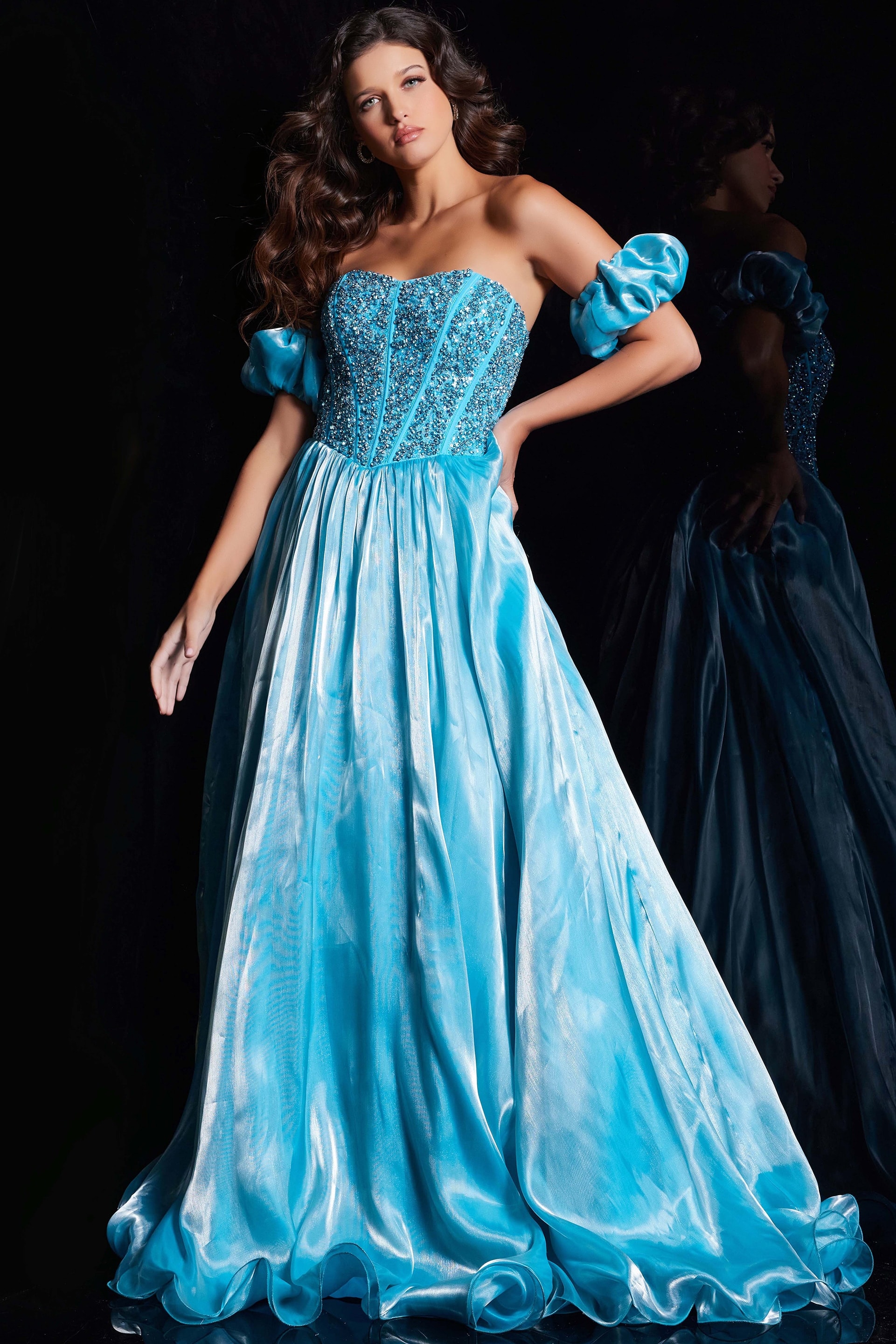 Model wearing Jovani 36591 blue ball gown with sweetheart neckline and off-the-shoulder puff sleeves, front view.