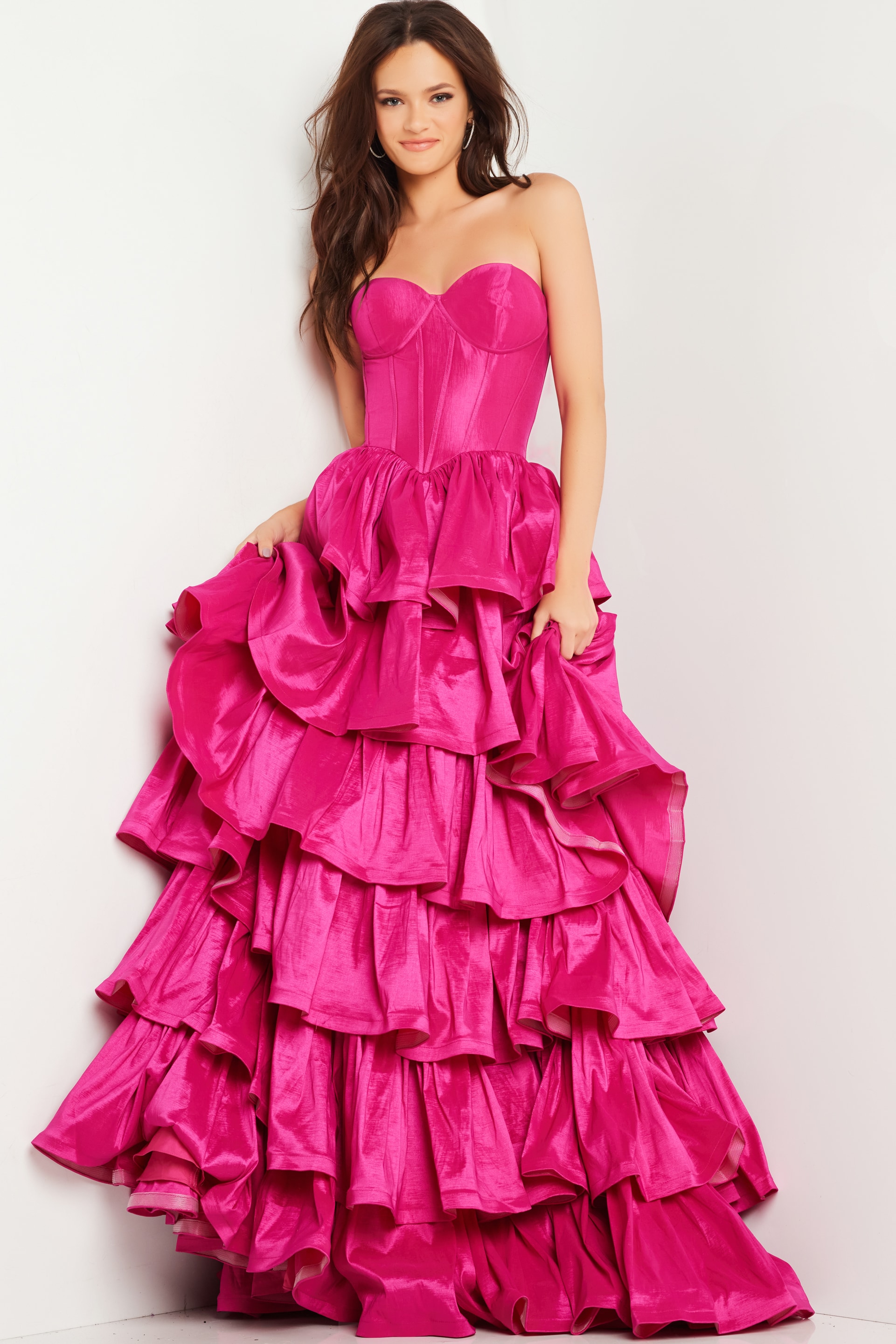Model wearing Jovani 36619 fuchsia ball gown, close-up front view.