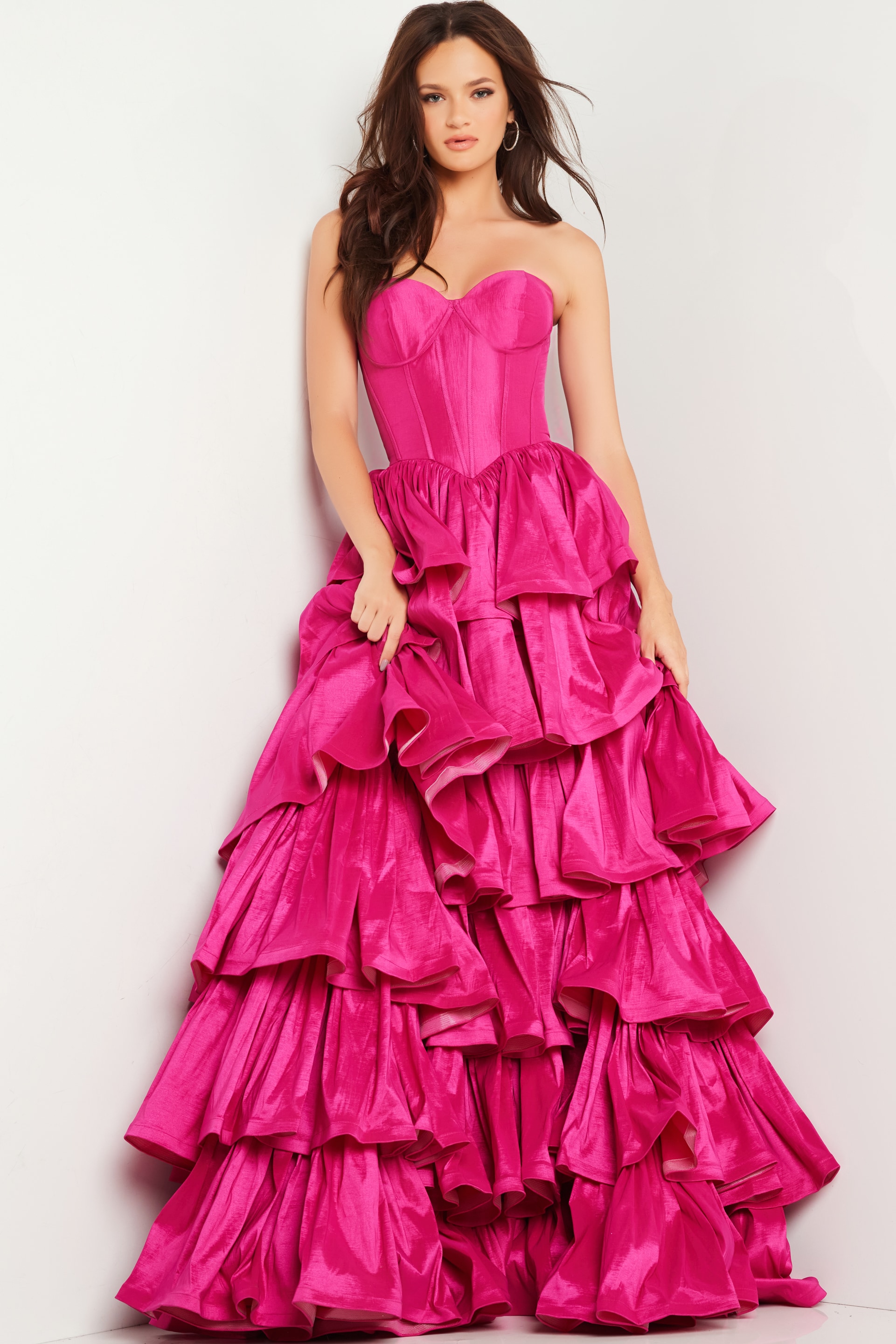 Model wearing Jovani 36619 fuchsia ball gown, full length front view.