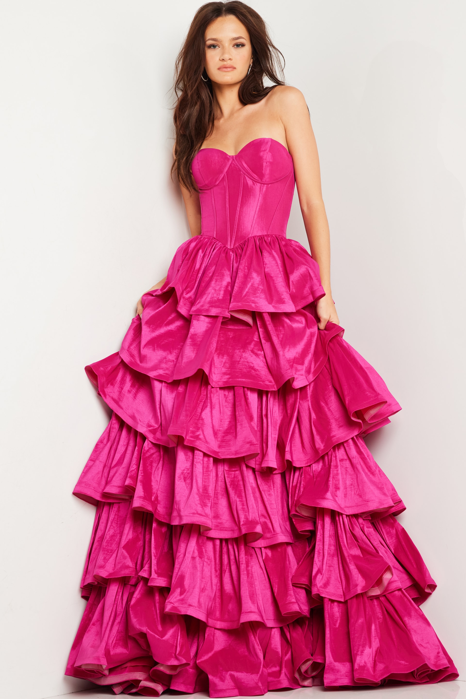 Model wearing Jovani 36619 fuchsia ball gown, close-up front view.