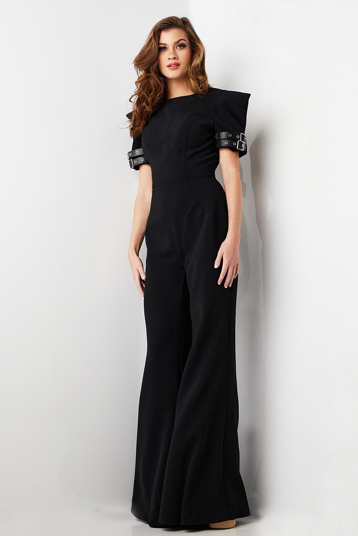 model demonstrating Jovani 36692 stylish black jumpsuit with buckle detail