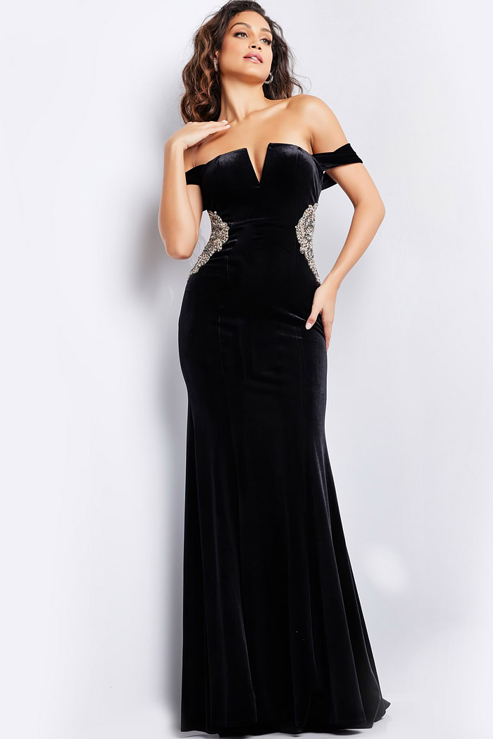 Model wearing Jovani 36733 black off-the-shoulder gown, front pose.