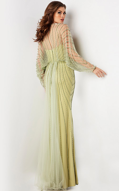 Back view of model wearing 36744 green dress highlighting beaded back design