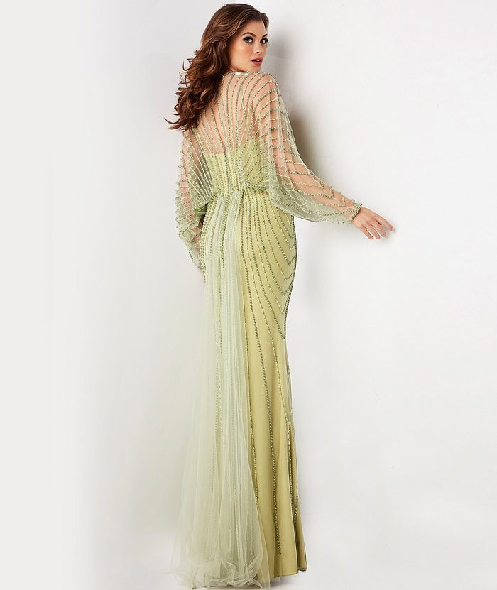 Back view of model wearing 36744 green dress highlighting beaded back design