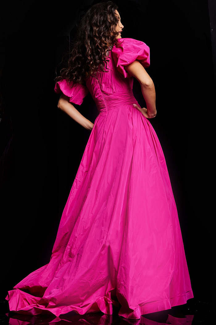 Model in Jovani 36872 fuchsia gown, full length back view with flowing skirt.