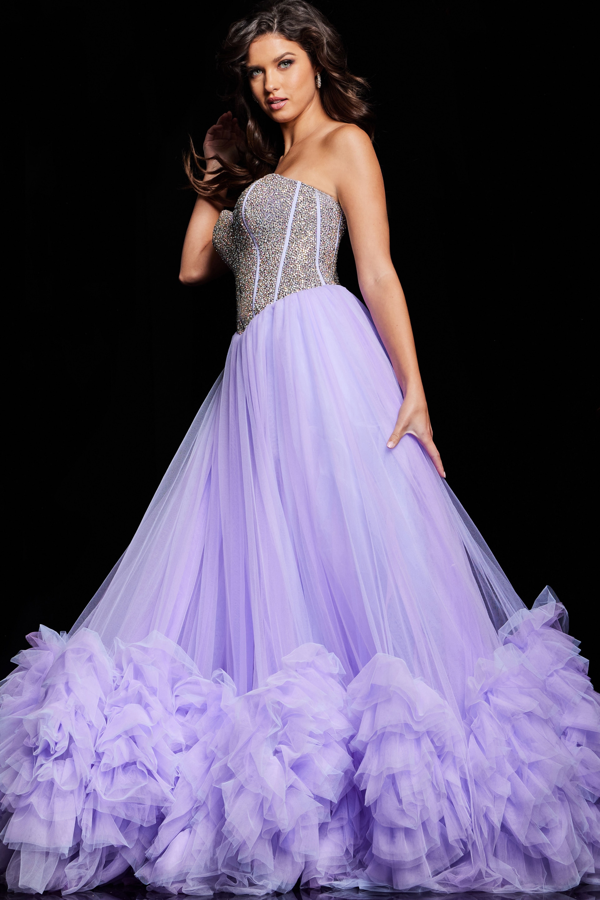 Model displaying Jovani 37199 lilac gown with sweetheart neckline and ruffled hem, front view.
