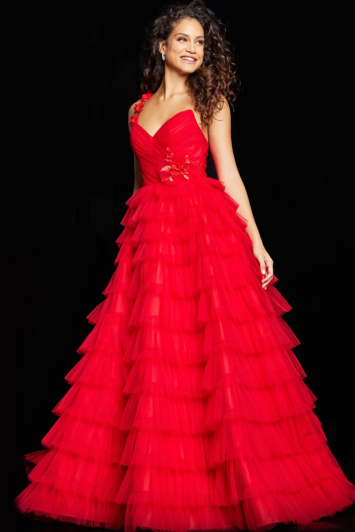 Model wearing Jovani 37274 red gown with sweetheart neckline and floral appliqué, front view.