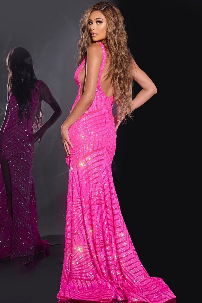 Model wearing Jovani 38053 pink dress viewed from the back showing elegant silhouette.