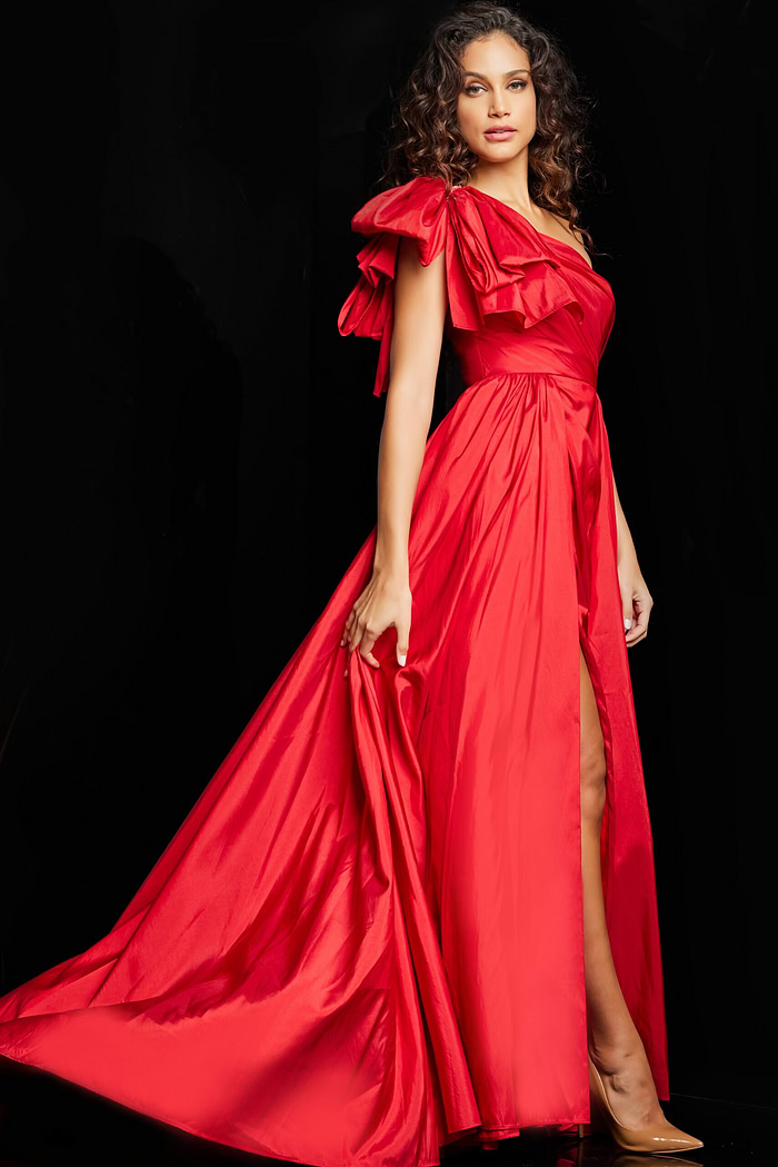 Model in Jovani 38466 red gown, showing off the A-line silhouette with high slit.