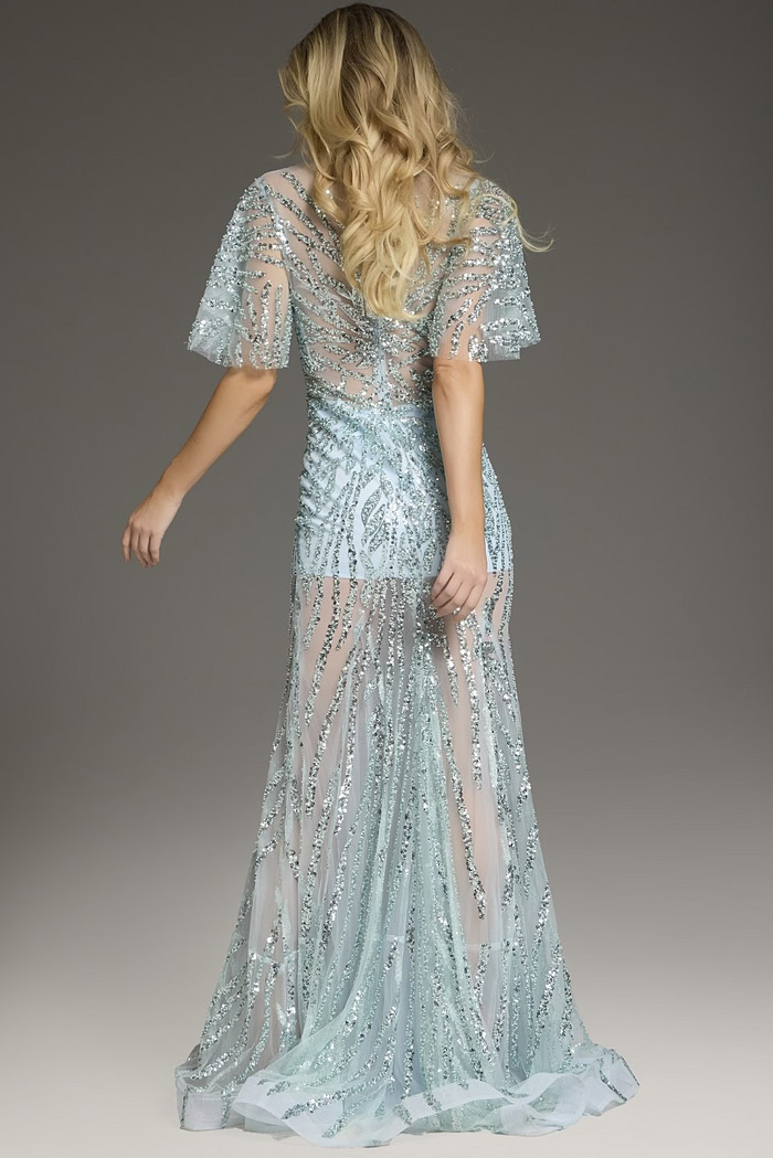 Back view of model wearing Jovani 39008 blue gown with glittering accents.