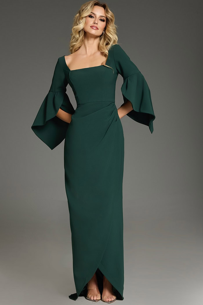 Model wearing Jovani 39082 elegant green dress with bell sleeves, front view