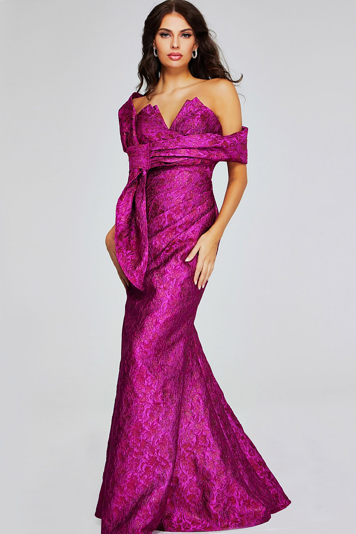 Model wearing Jovani 39114 fuchsia mermaid gown, front view.