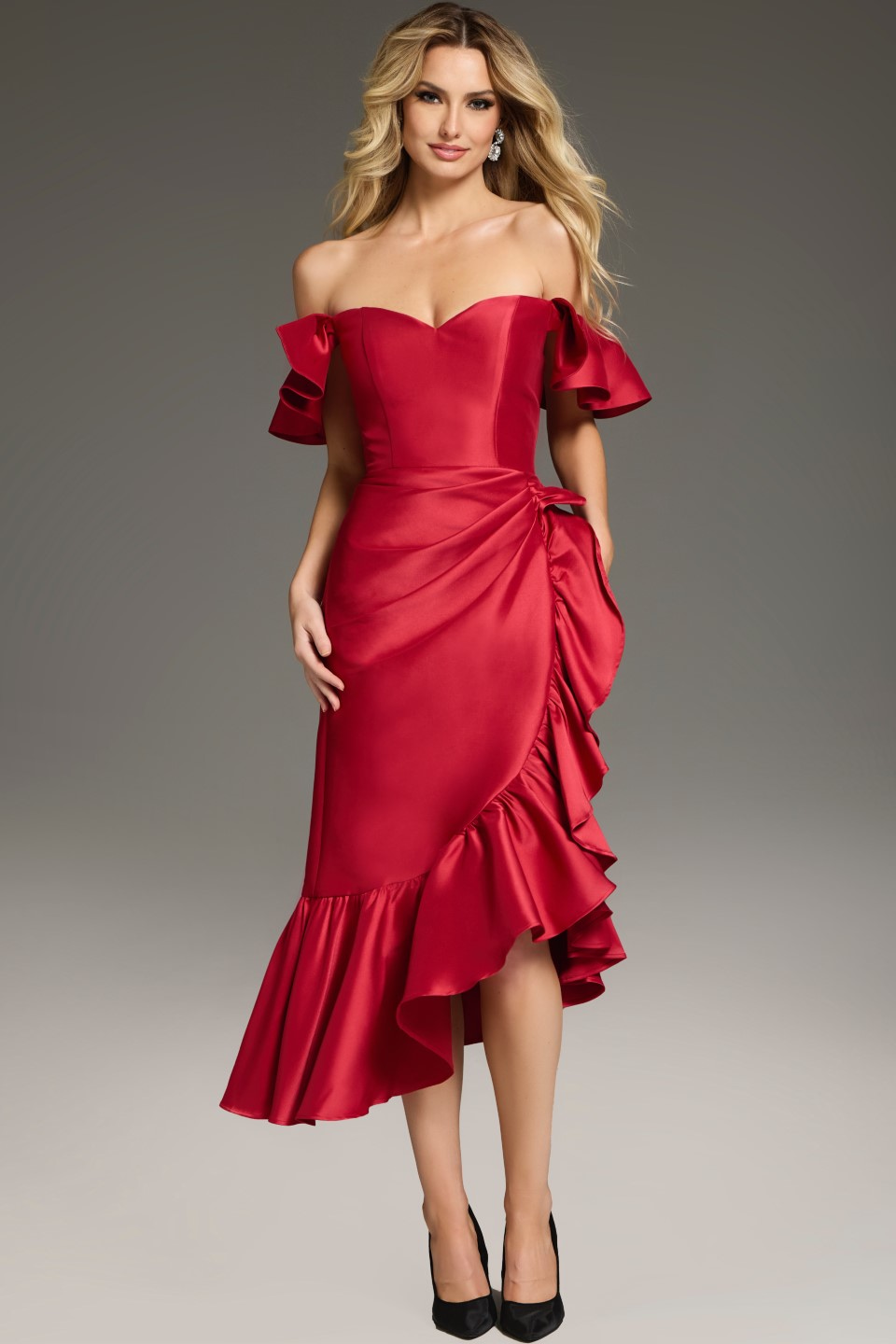 Model wearing Jovani 39264 red dress showcasing off-the-shoulder neckline and ruffles