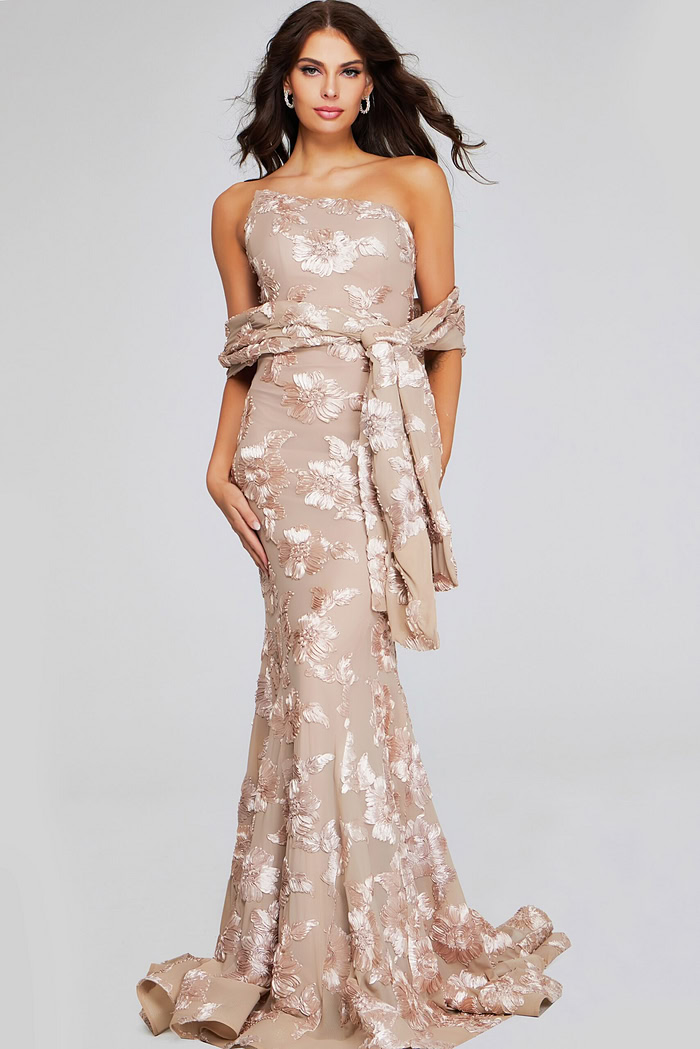 Model wearing Jovani 39267 beige gown with floral embroidery from a full-length front view.