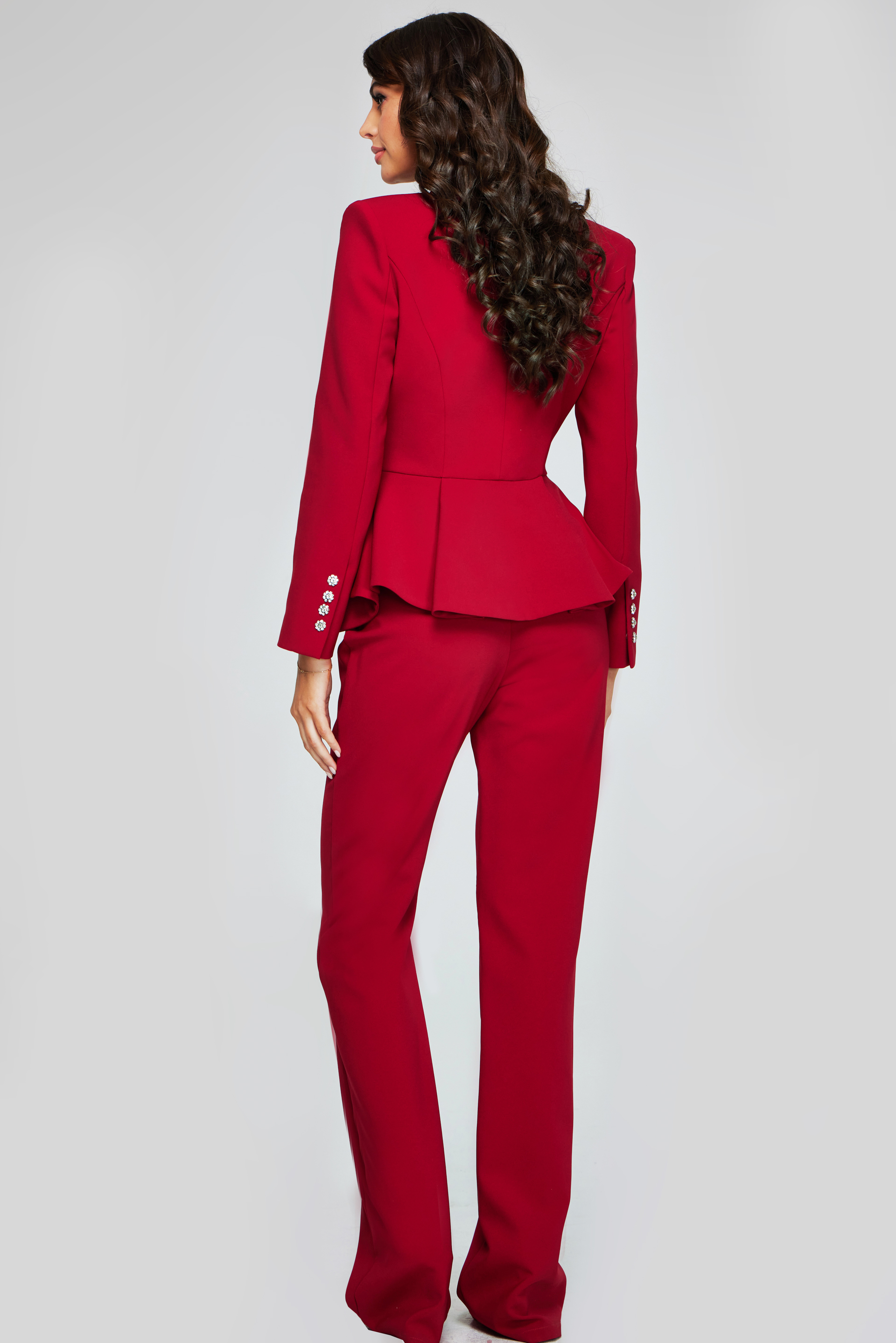 model wearing 39374 red two-piece suit, back view with focus on blazer structure
