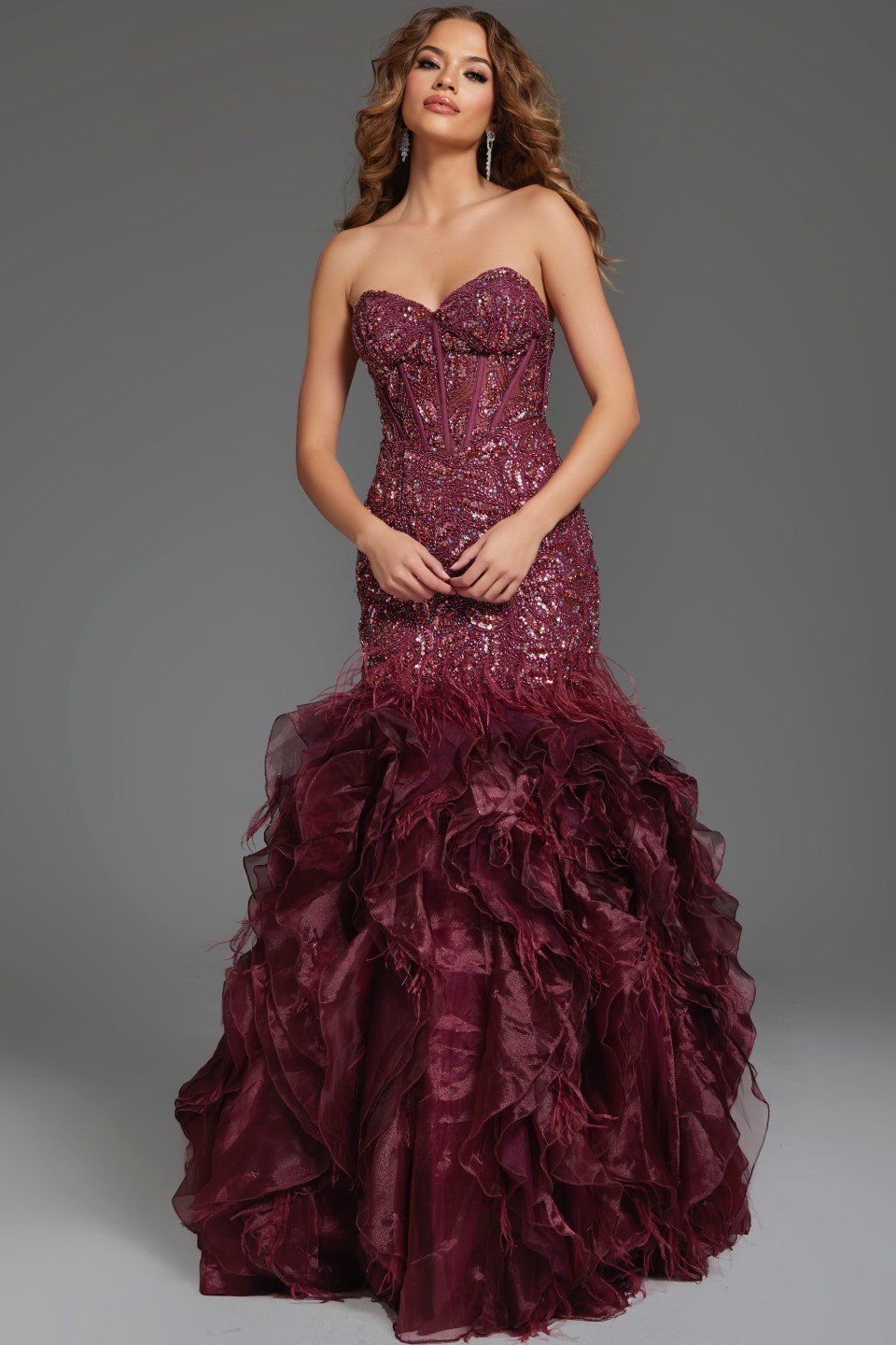 Front view of model in Jovani 39712 burgundy dress with a sweetheart neckline.