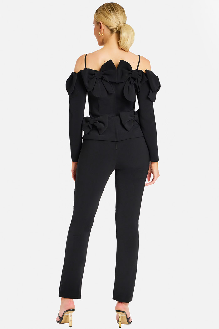 Back View of Black Fitted Pantsuit Featuring Multiple Structured Bows and Spaghetti Straps