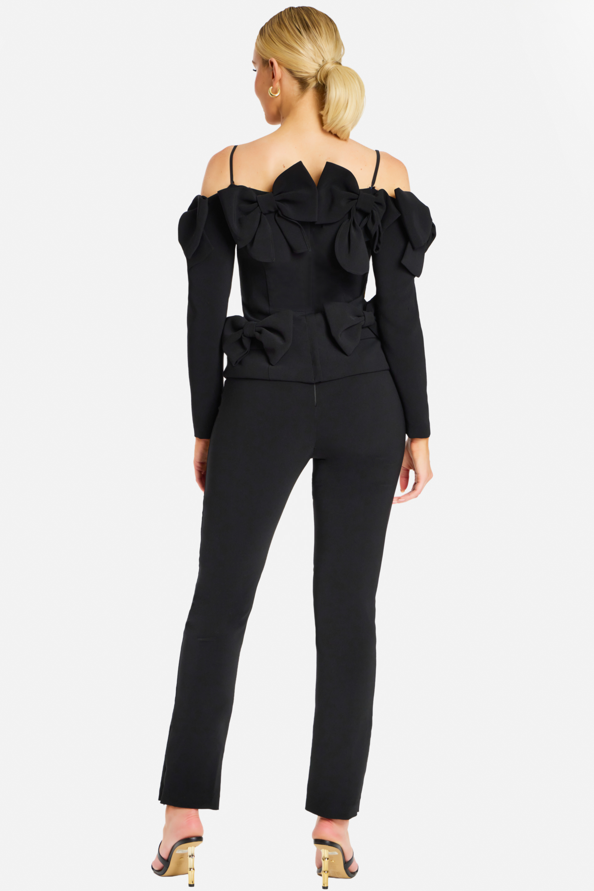 Back View of Black Fitted Pantsuit Featuring Multiple Structured Bows and Spaghetti Straps