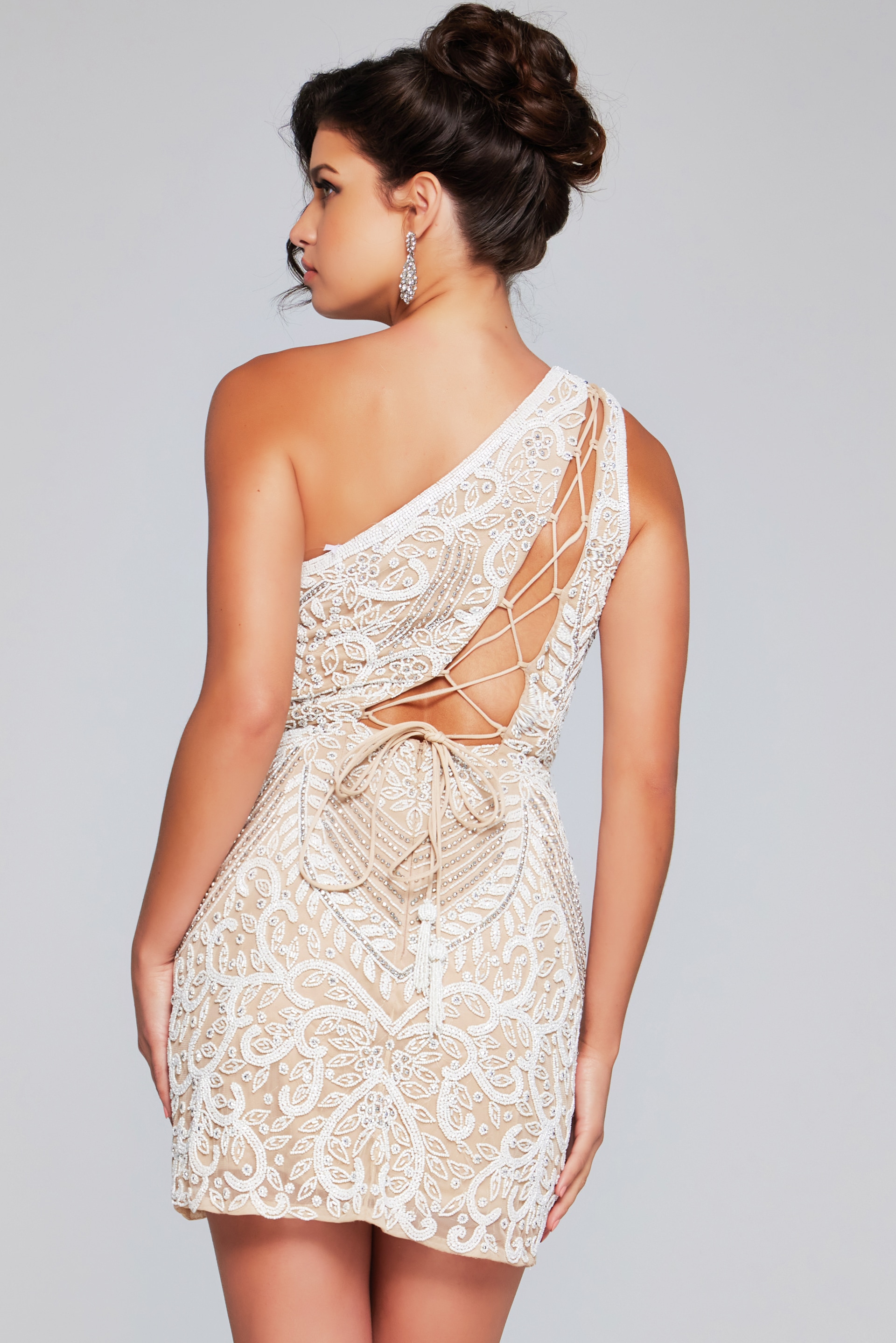 Model wearing Jovani 39896 mini dress in Blue with decorative lace.