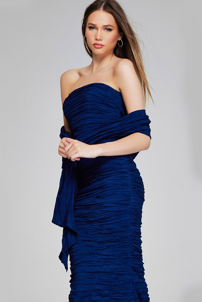 Model wearing Jovani 40045 navy mermaid gown, close-up front view.