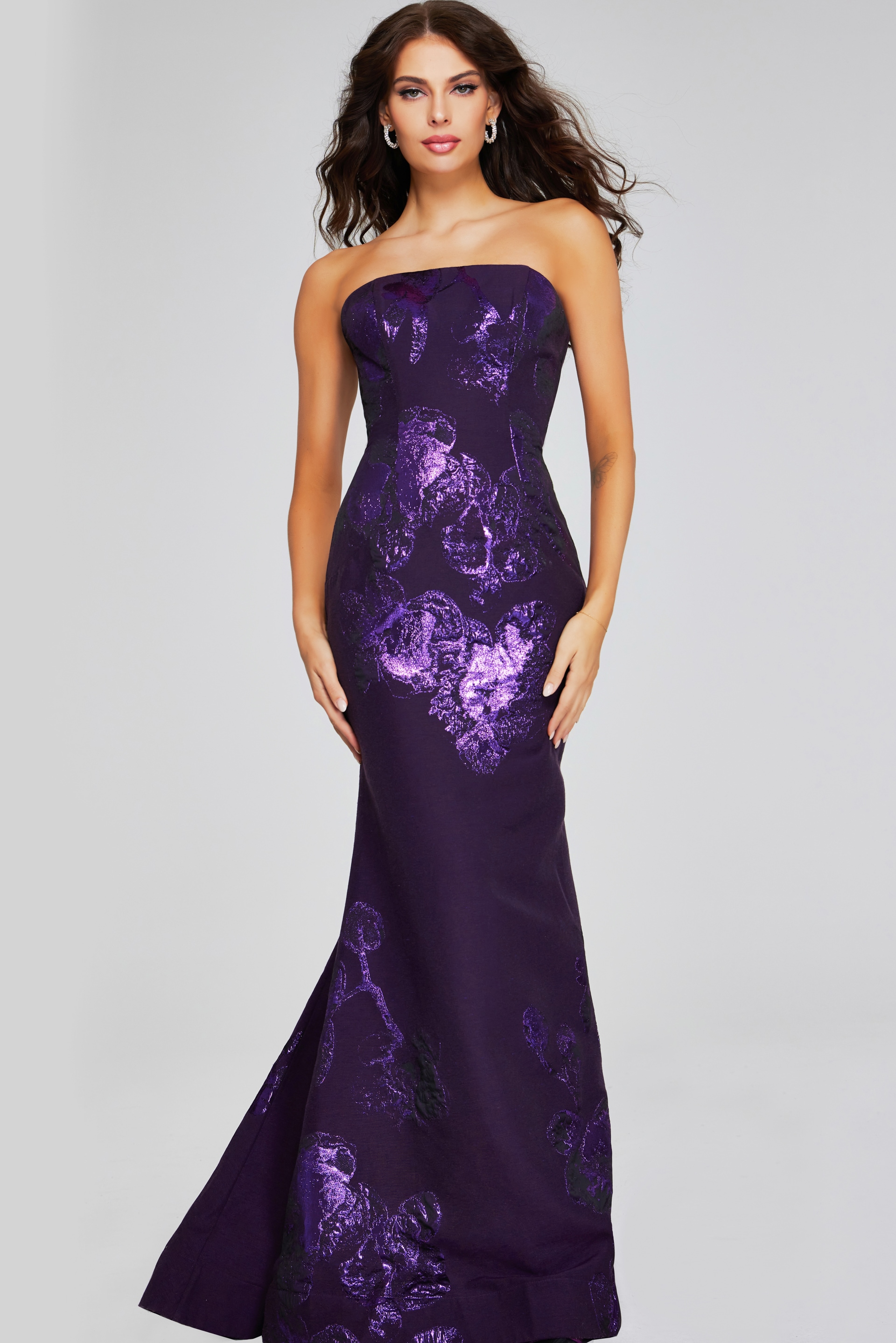 Model wearing Jovani 40318 in purple, front view showing full length.