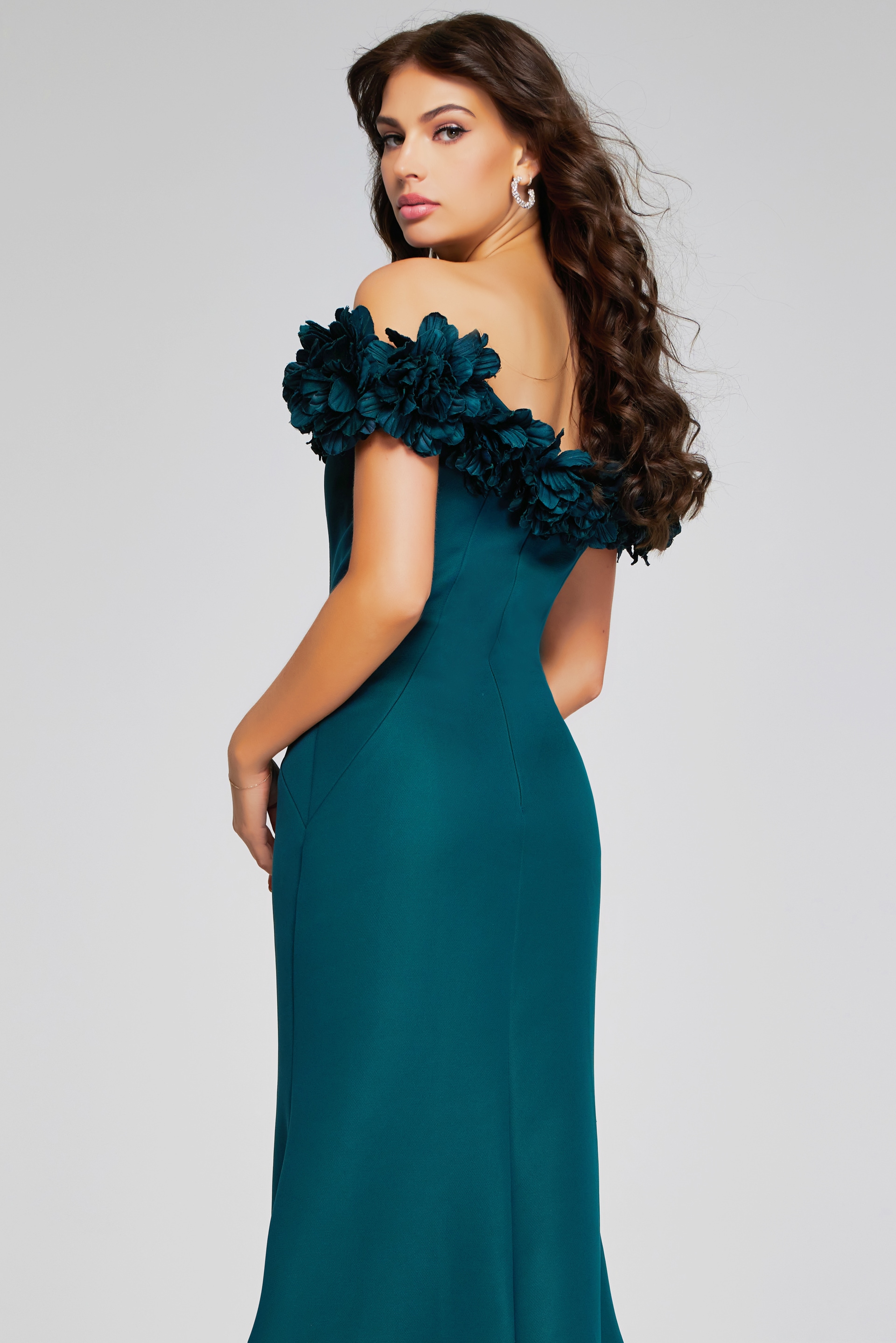 back view of Jovani 40595 emerald dress with off-the-shoulder floral decoration