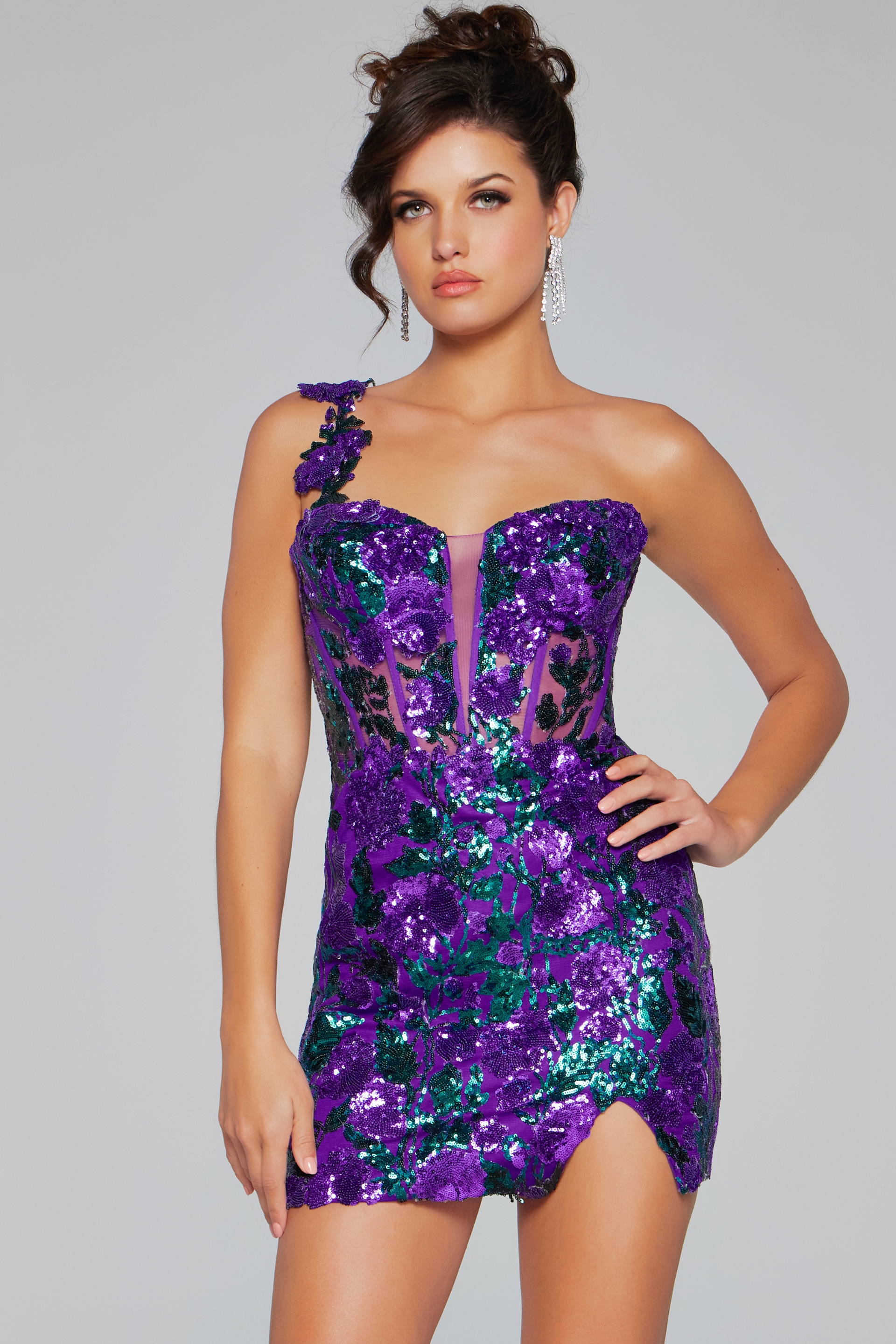 Model wearing Jovani 40647 purple dress with asymmetrical neckline and sequin embellishments, front view.