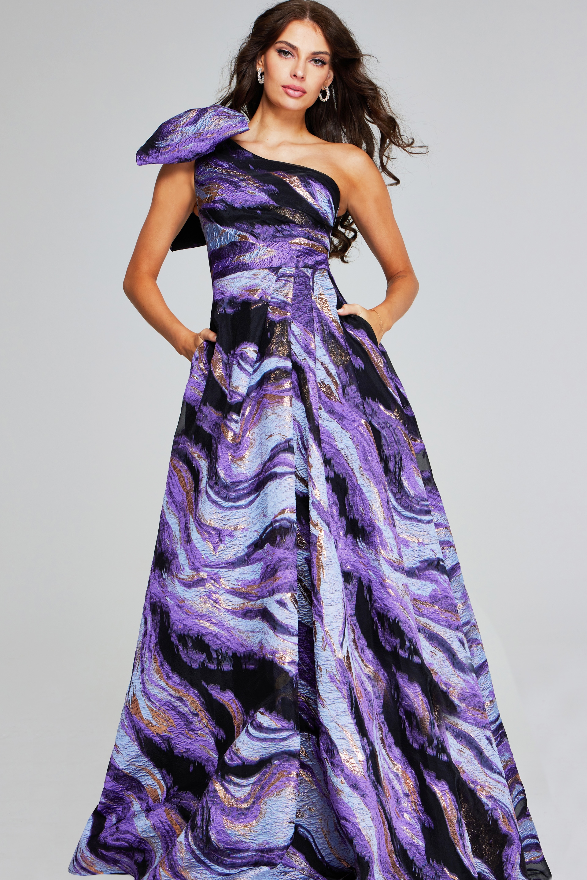 model wearing Jovani 40695 purple gown, frontal view showcasing A-line silhouette