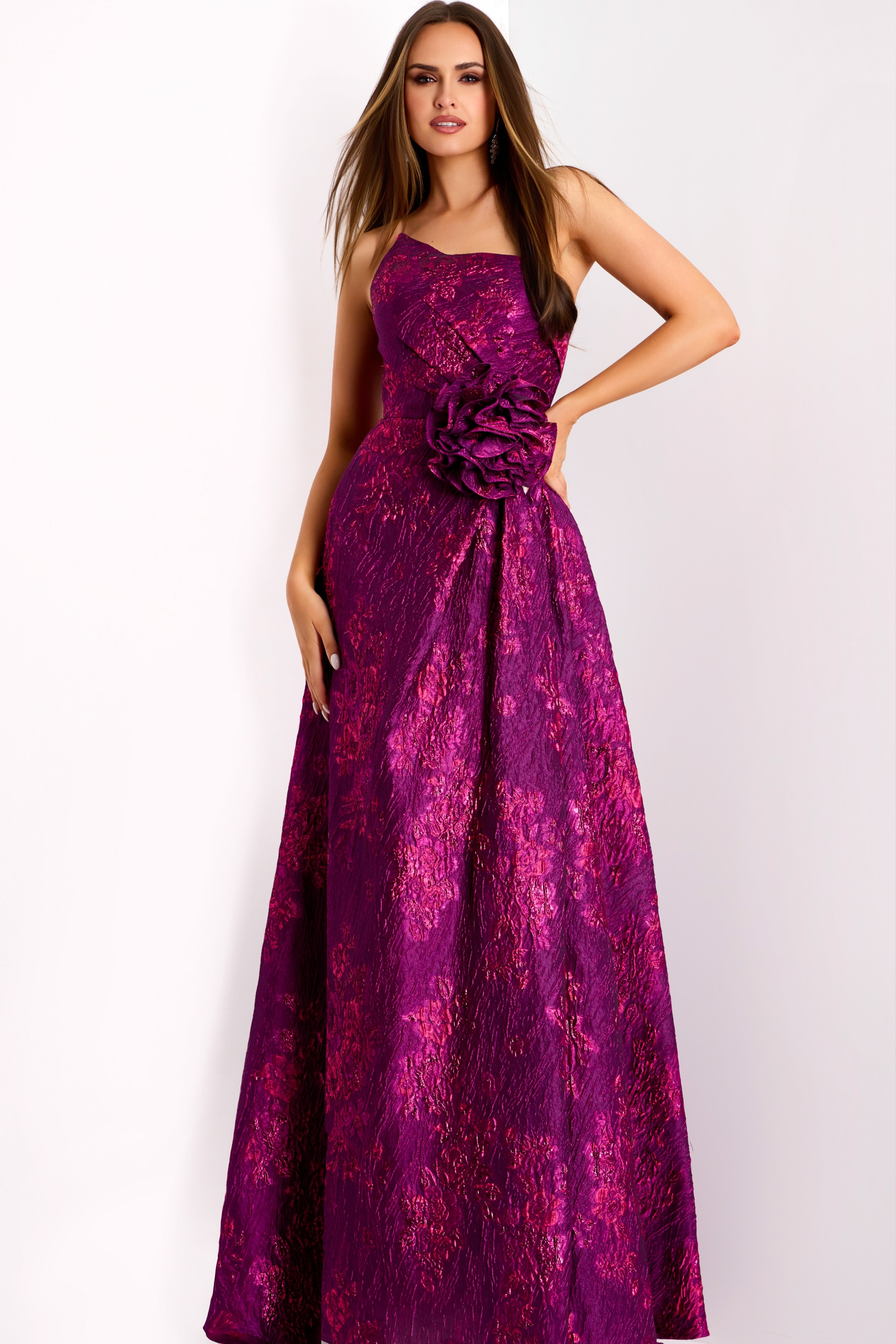 One-shoulder fuchsia jacquard gown with floral rosette detail