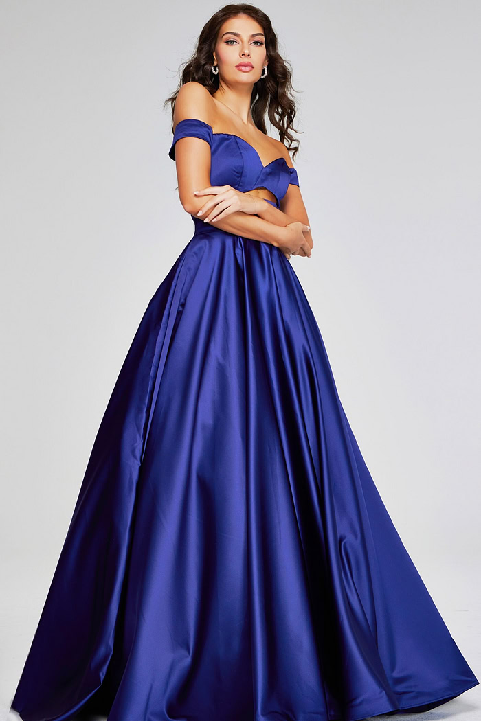 Model wearing Jovani 40787 purple off-the-shoulder dress, front view close-up.