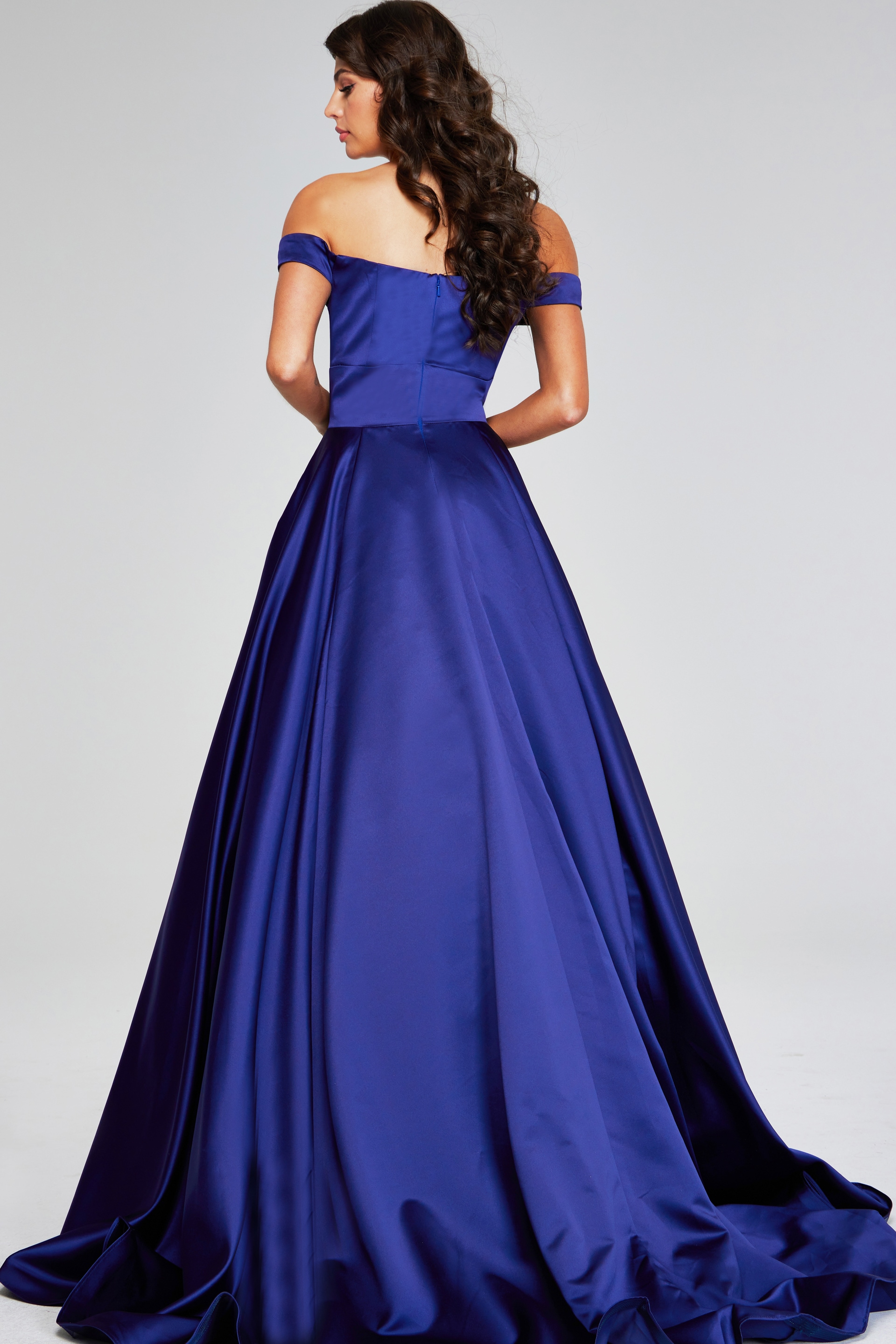 Model wearing Jovani 40787 purple off-the-shoulder dress, back view.