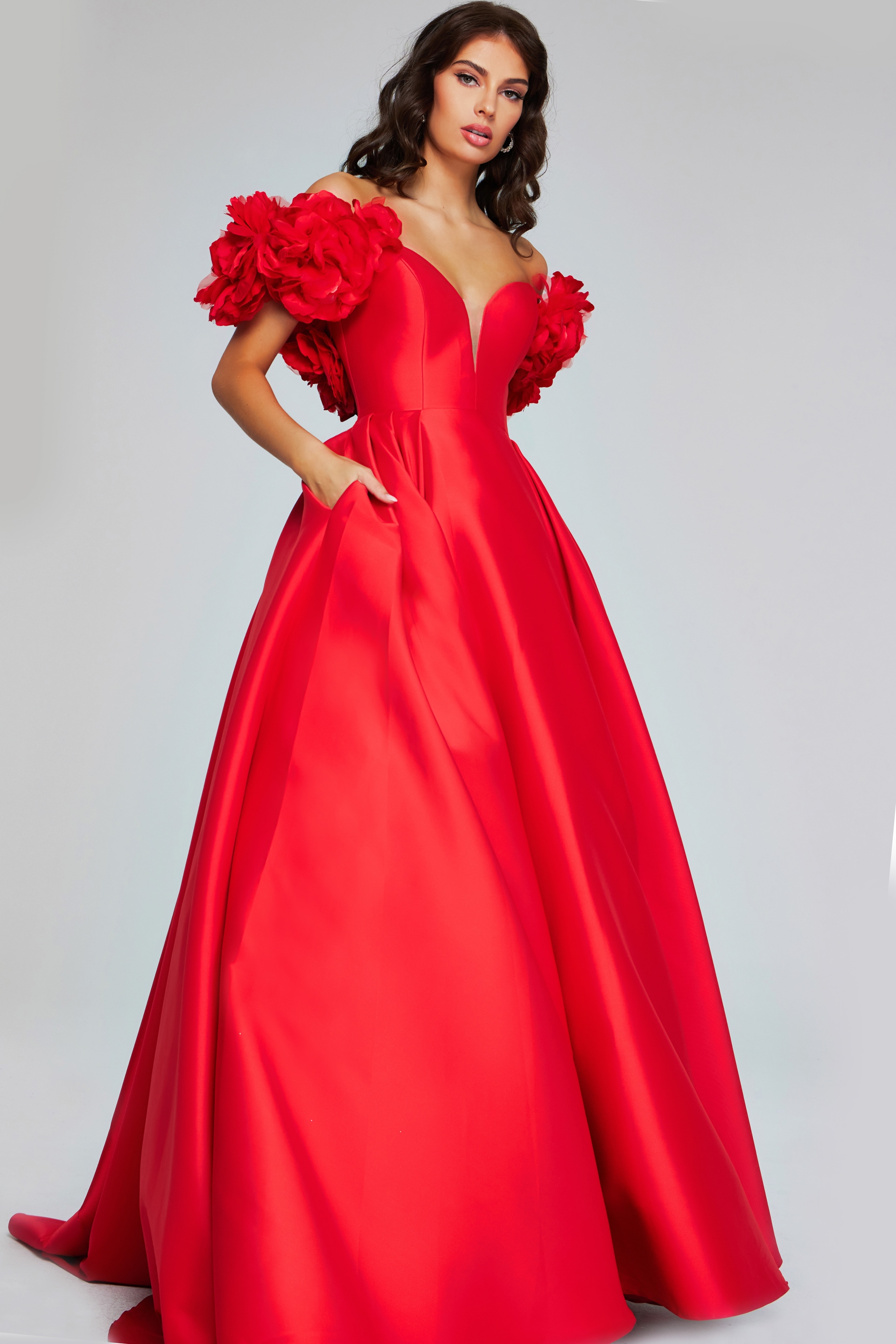 Model wearing Jovani 40794 elegant red ball gown with sweetheart neckline