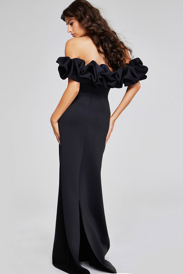 Model wearing Jovani 41084 dress showing back view with ruffled sleeves.