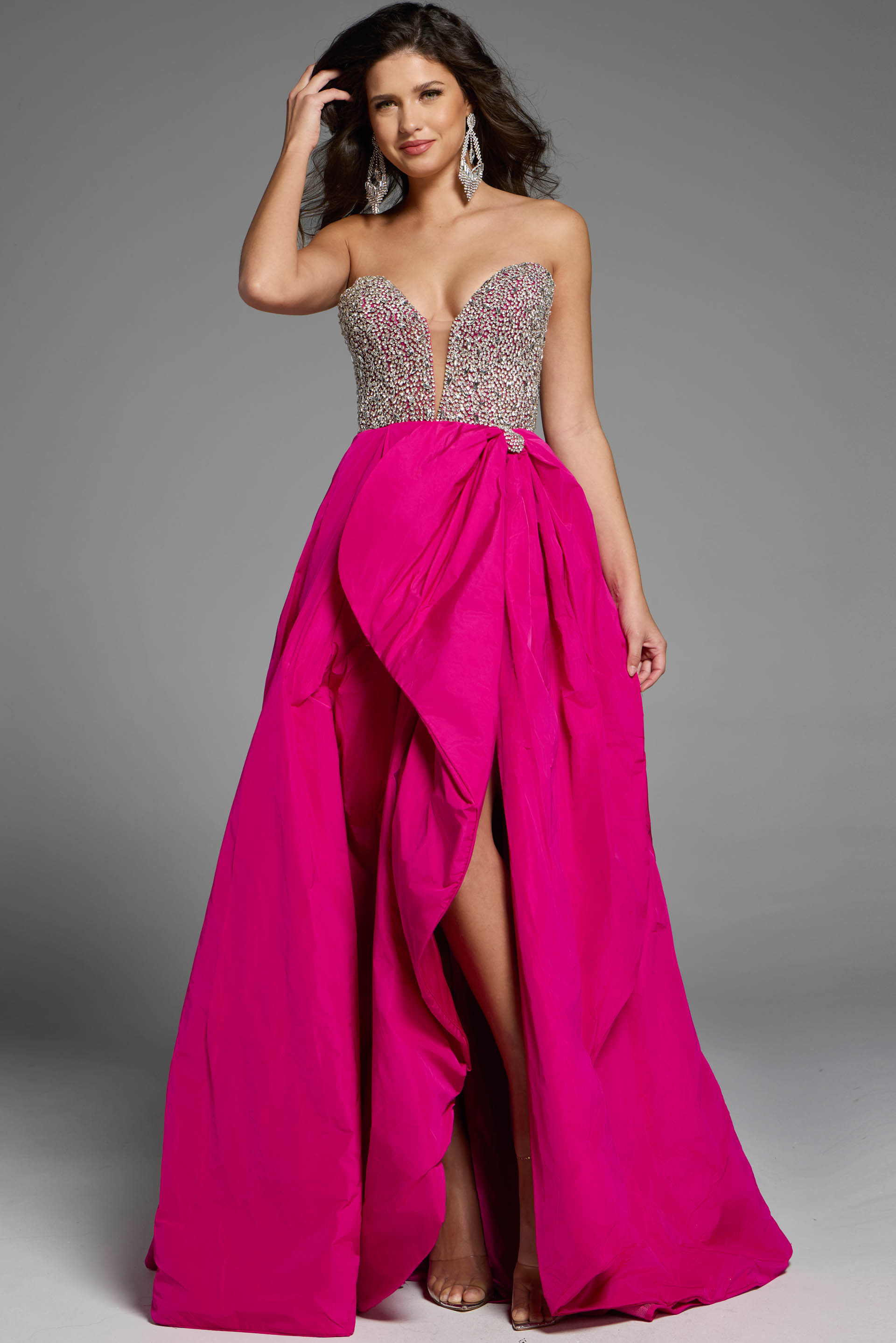 Strapless evening gown with a crystal-embellished bodice and layered overskirt