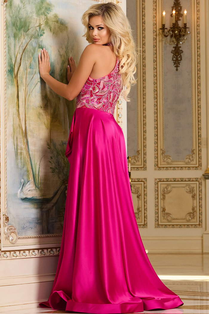 Model wearing Jovani 41186 fuchsia gown with embellished bodice, back view