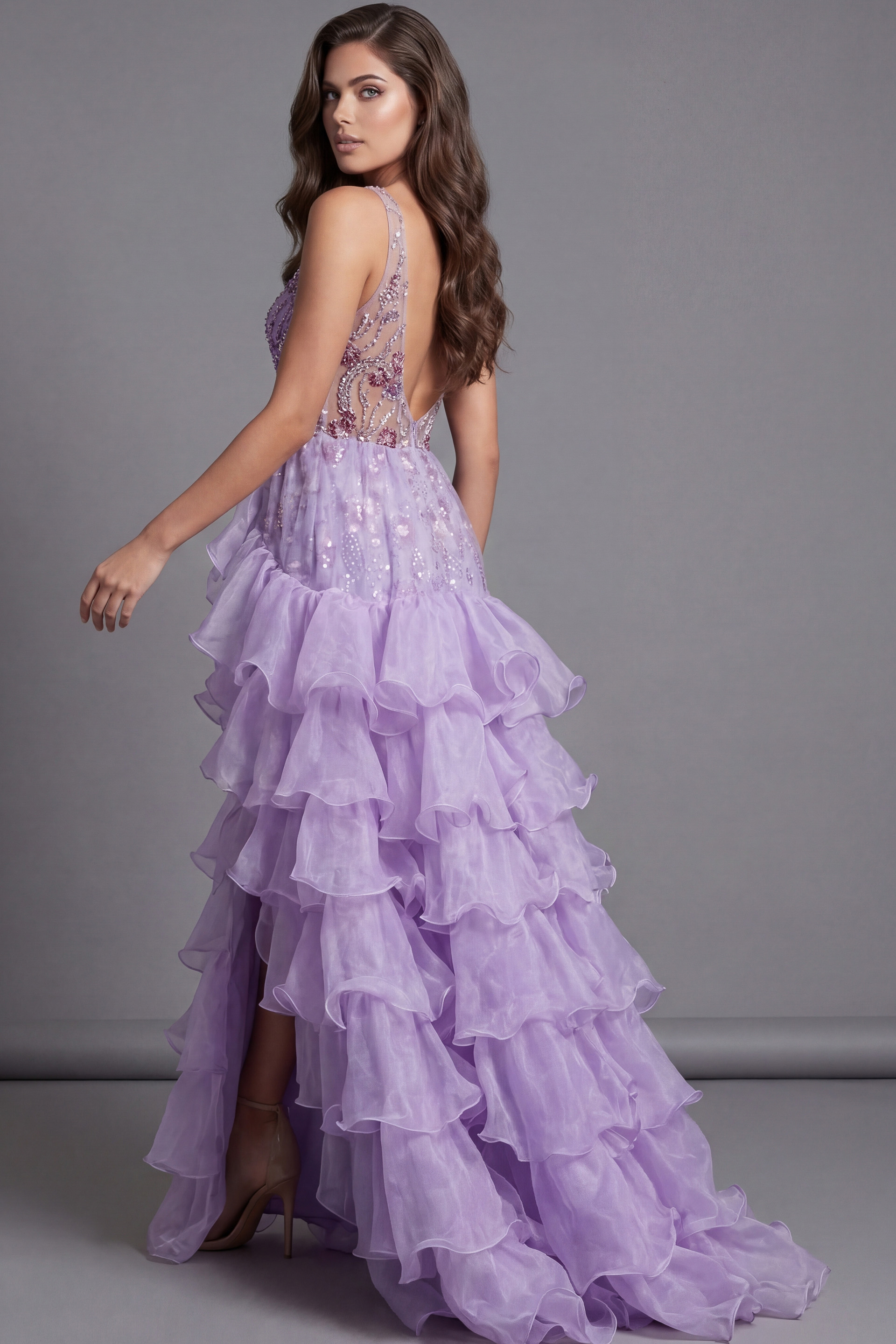 Open back embellished gown with layered ruffle skirt
