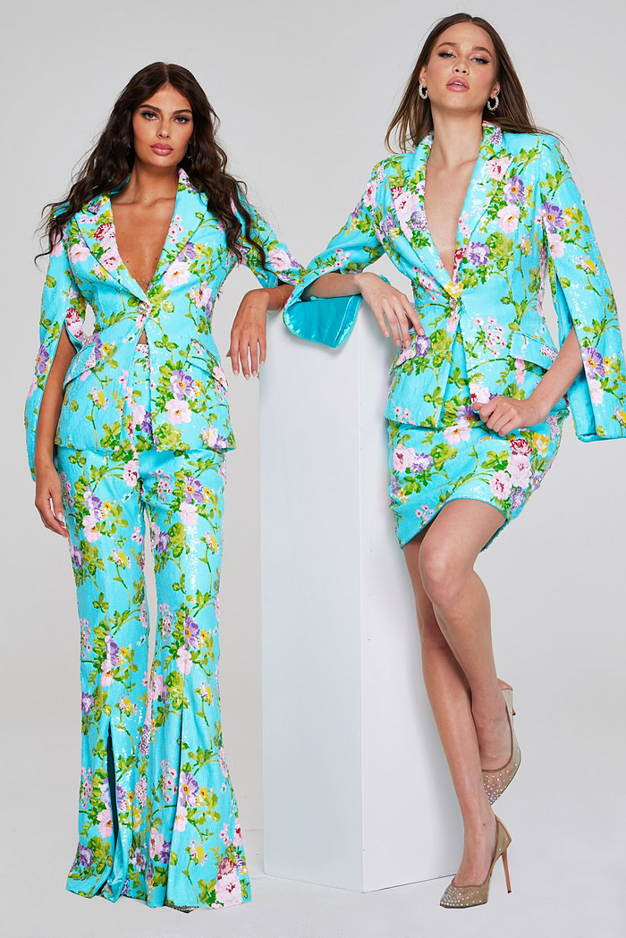 front view of models in Jovani 42146 floral print jacket and pants, and another similar ensemble.