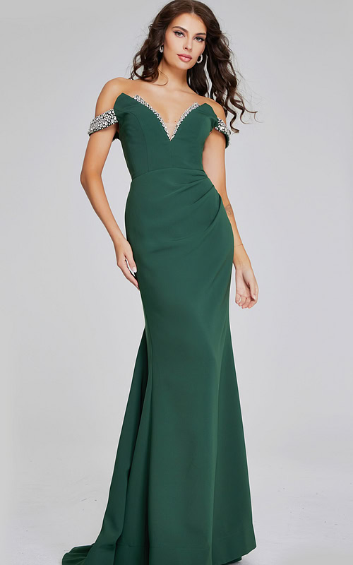 Model wearing Jovani 42394 floor-length green gown with beaded off-the-shoulder neckline from the front.
