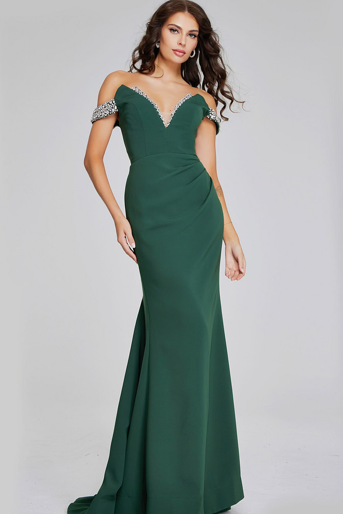 Model wearing Jovani 42394 floor-length green gown with beaded off-the-shoulder neckline from the front.