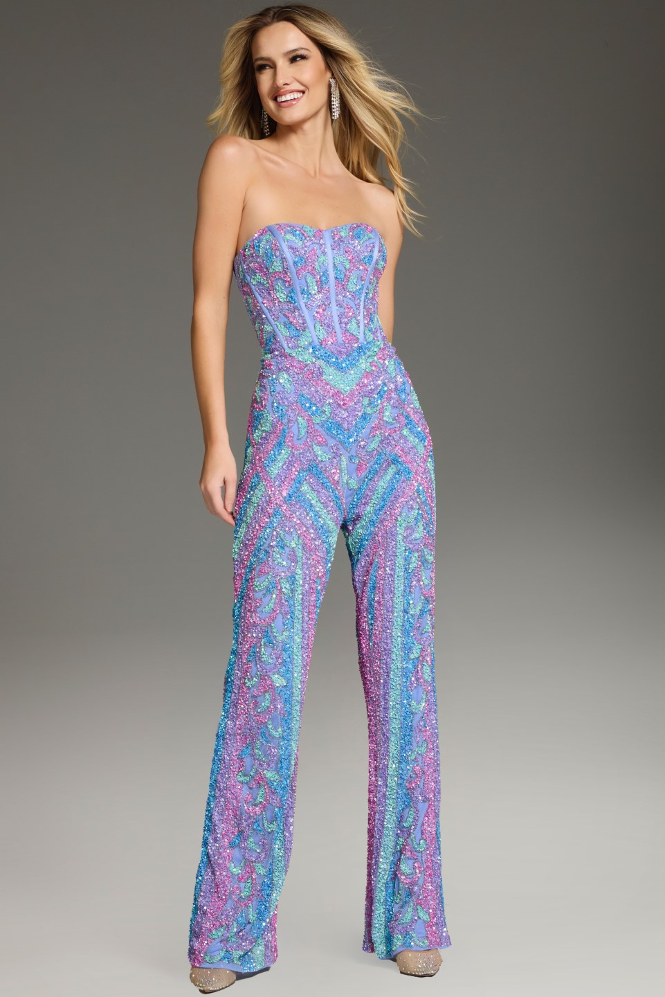 front view of model wearing Jovani 42597 blue sequin jumpsuit