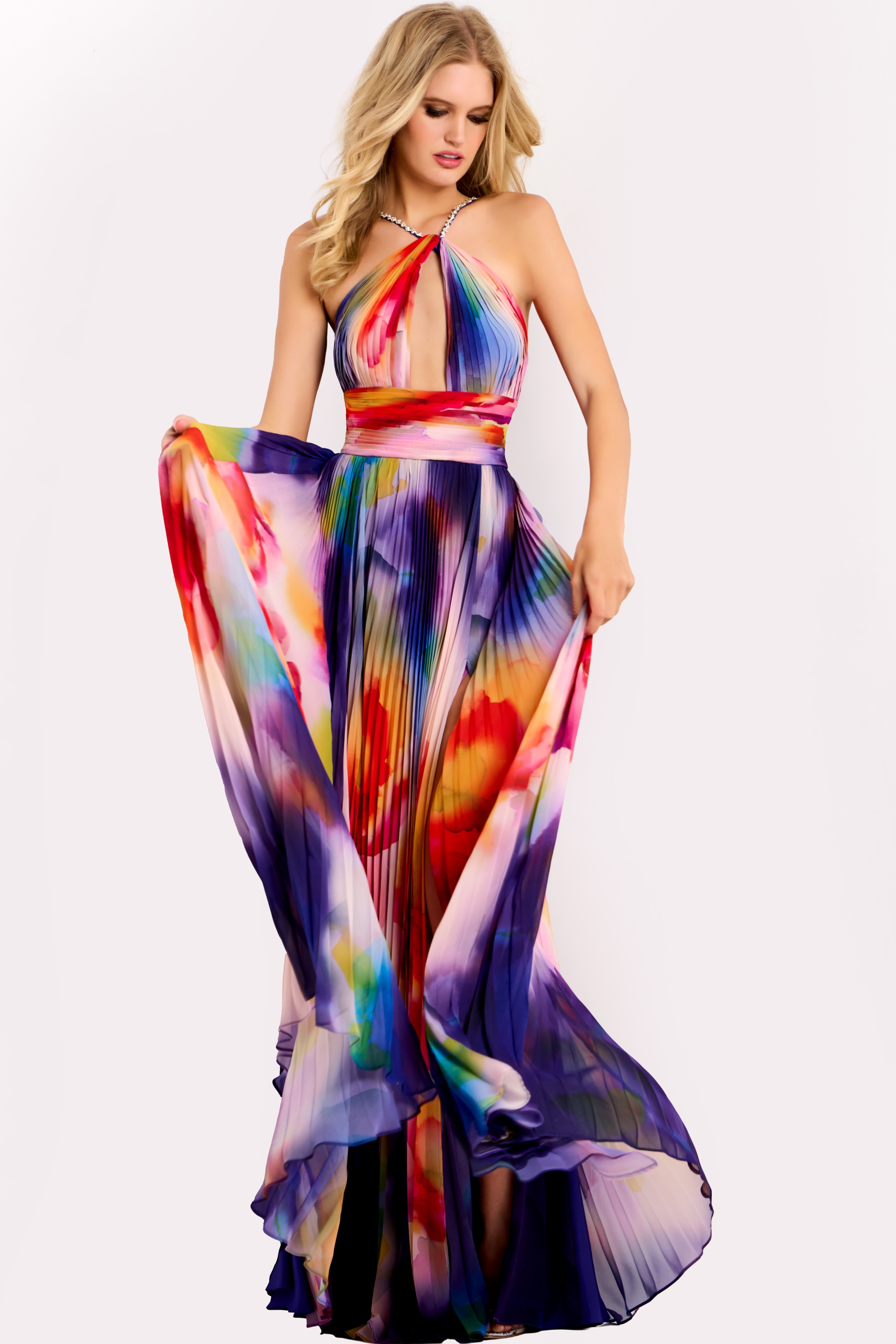 Flowing A-line gown with high slit and vibrant rainbow pattern