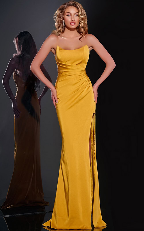 Model wearing Jovani 42765 yellow gown with straight neckline and high slit