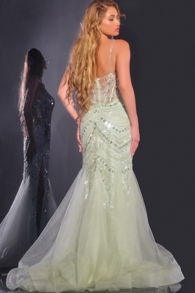Back view of Jovani 43189 green gown featuring elegant beadwork and flowing skirt.