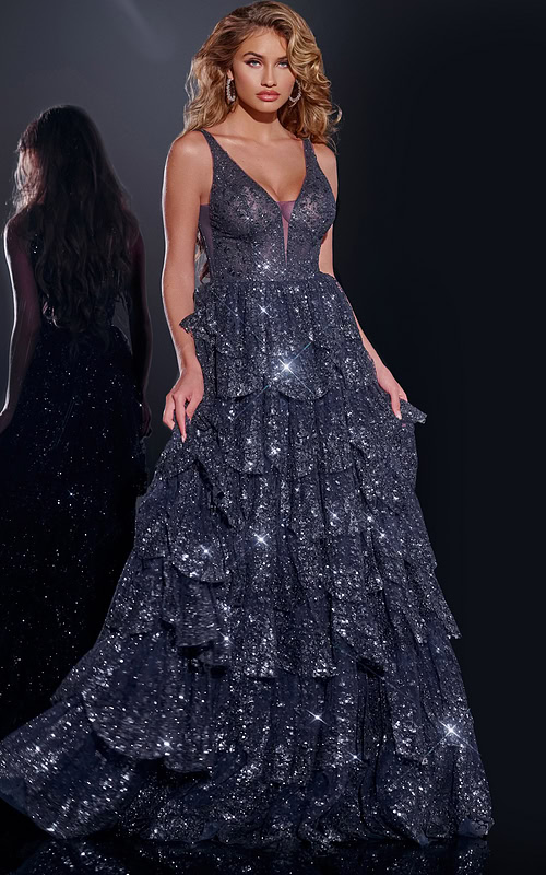 Model wearing Jovani 43198 navy blue sequined gown with plunging neckline front view