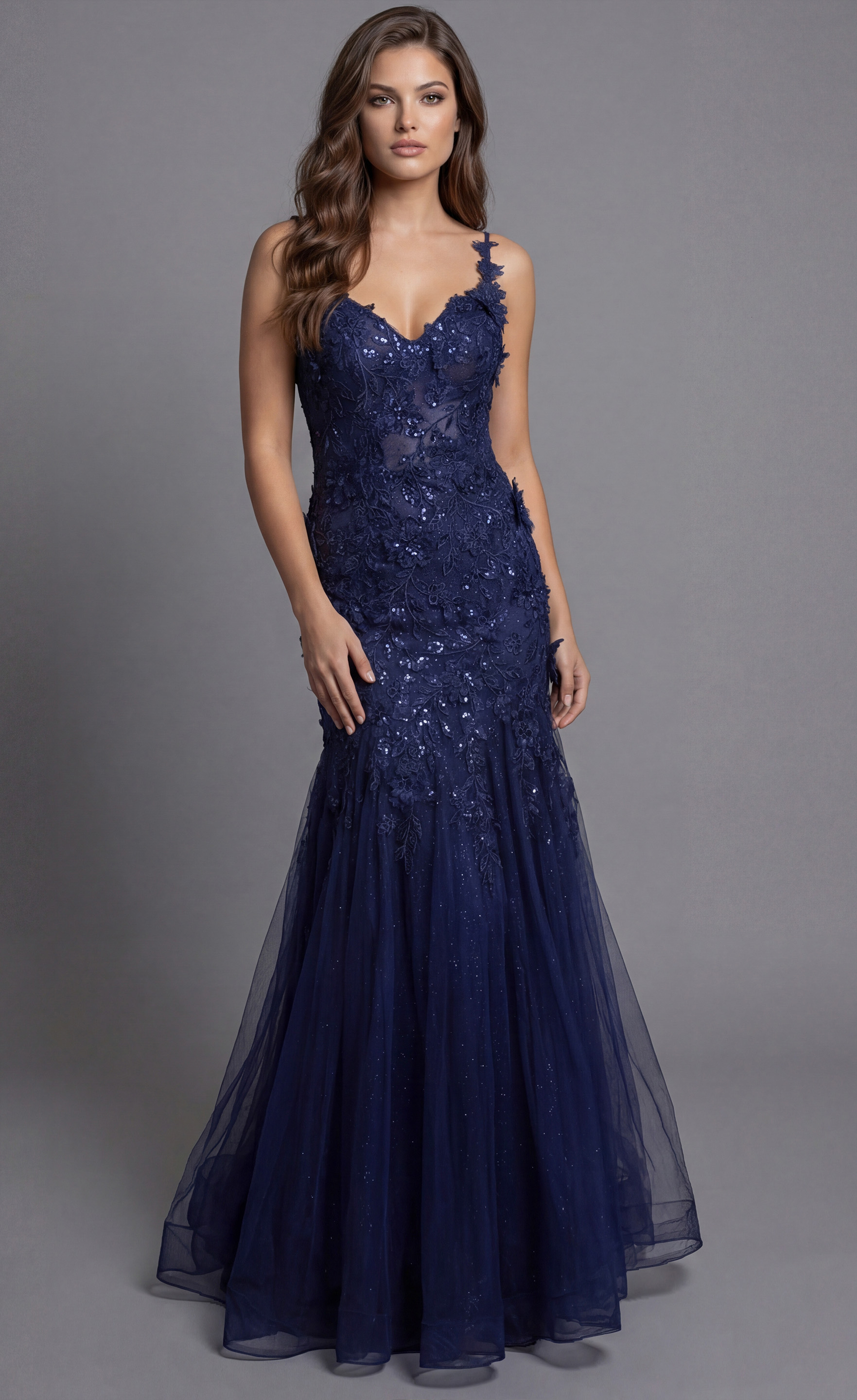 Jovani 43405 navy blue mermaid prom dress with floral lace appliqué straps, sweetheart neckline, sheer illusion side panels, sequin embellishments, and glitter tulle godet skirt.