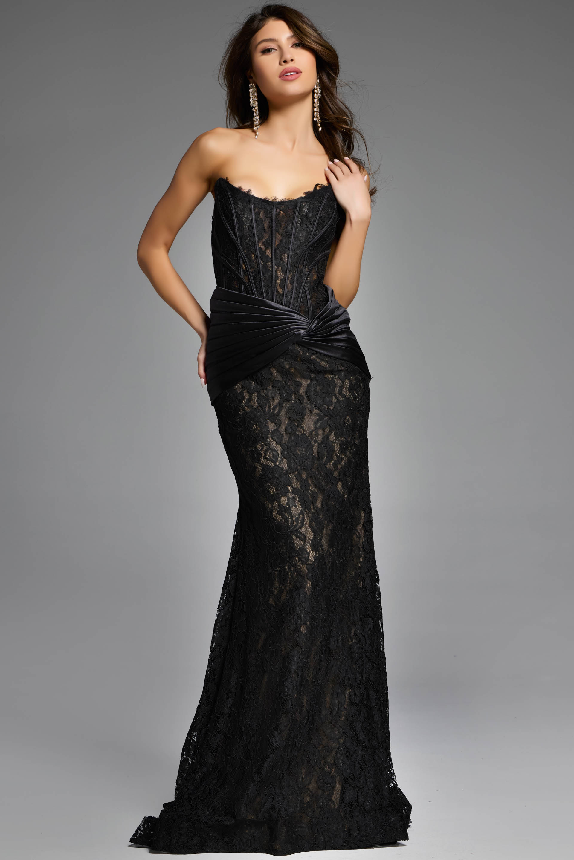 Strapless lace gown with satin detailing and corset bodice.
