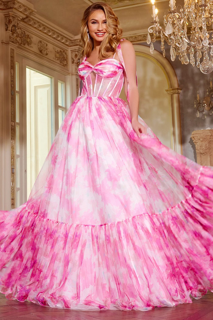 Model wearing Jovani 44181 pink dress with a sweetheart neckline and tiered skirt.