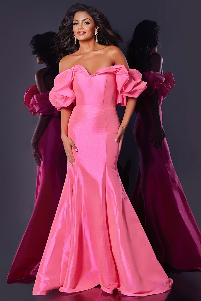 Front view of model wearing Jovani 44271, pink mermaid silhouette gown with off-the-shoulder ruffled sleeves.