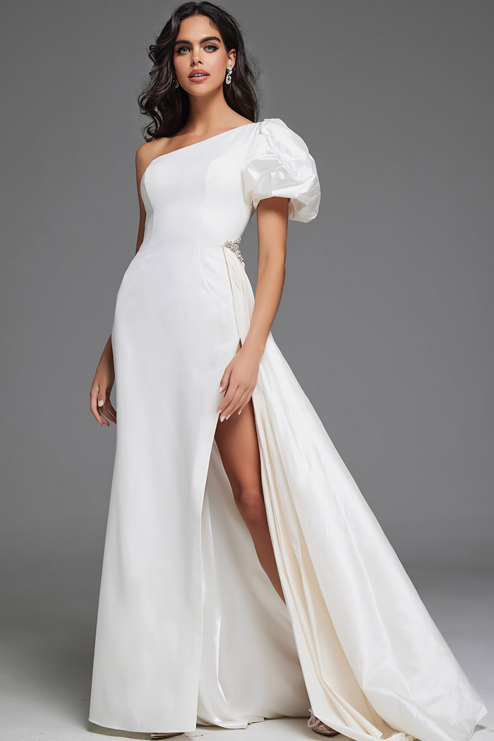 model wearing Jovani 44299 white one-shoulder gown front view with slit