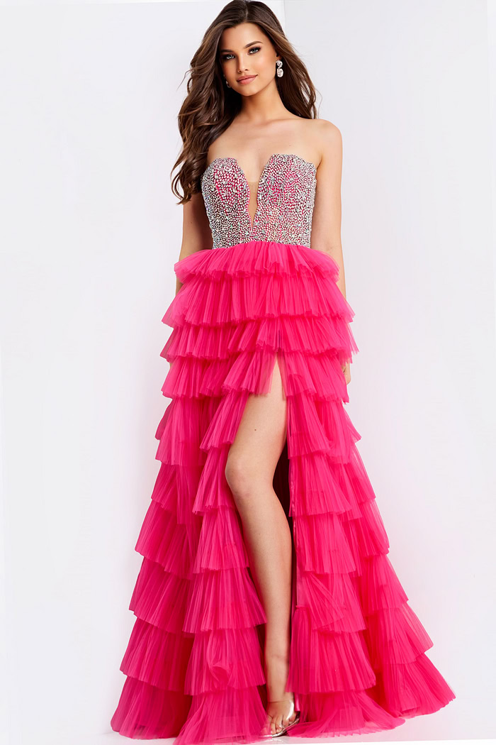 Strapless pink prom gown featuring layered ruffle skirt